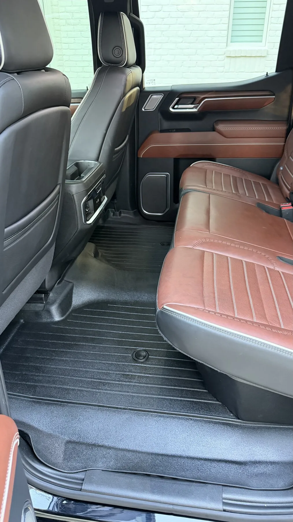 Chevrolet Silverado High Country saddle leather rear cab after a mobile interior detail